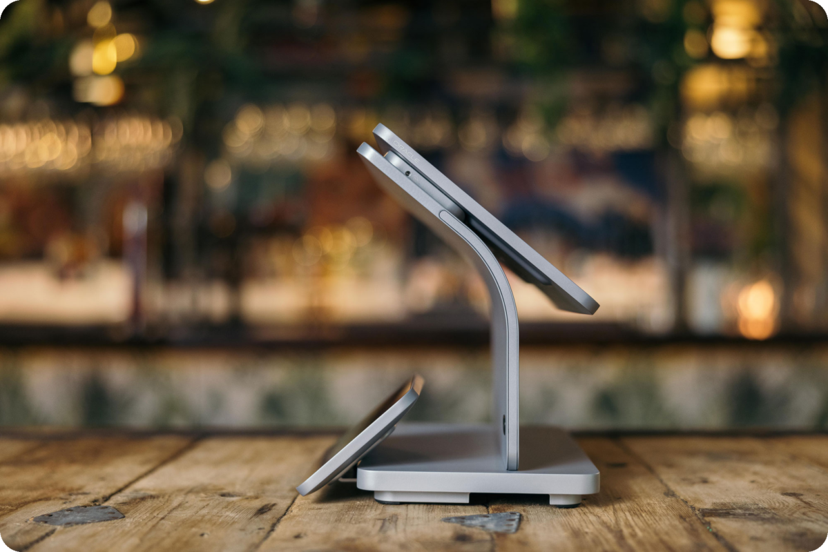 Oracle Simphony hardware displayed on a table in a restaurant